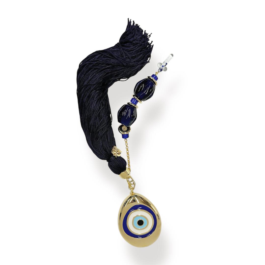 EVIL EYE PRESS PAPIER